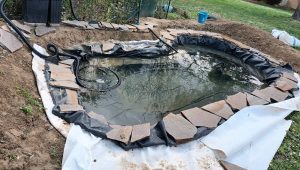 Remplissage avec l'eau du récupérateur et test d'étanchéité